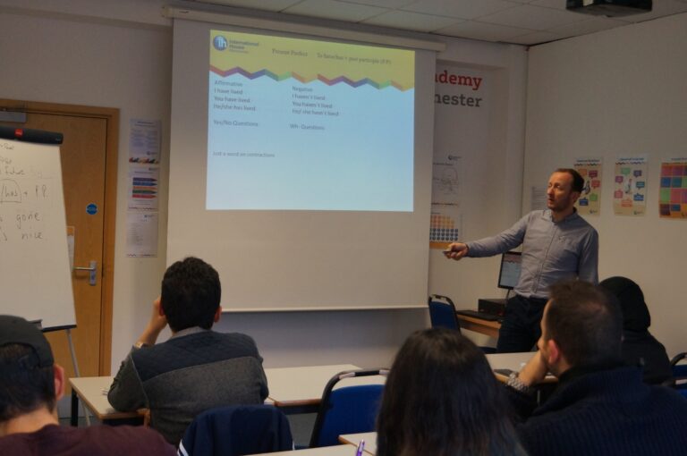 School PrincipSchool Principal John teaching a classal John teaching a class