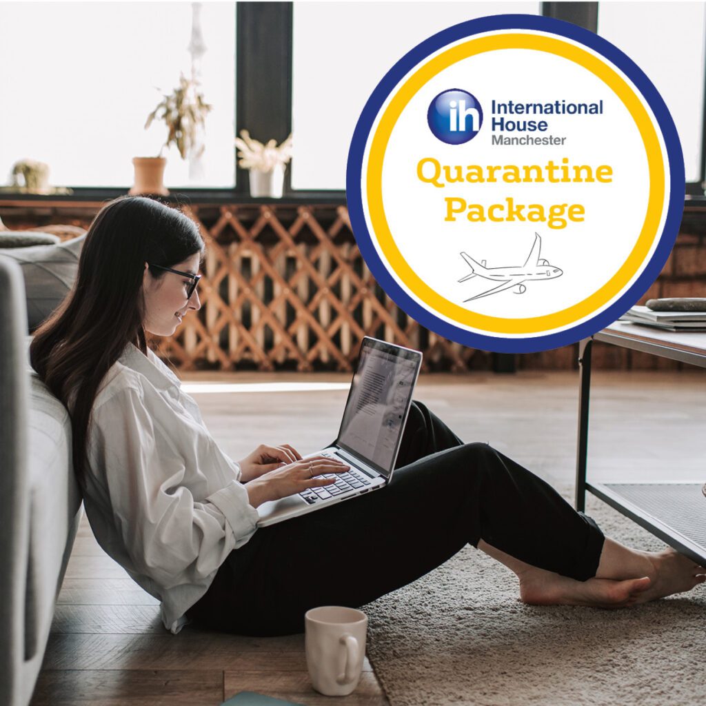 A woman sits on the floor working on a laptop. An overlaid graphic features an airplane icon and the text “IH Manchester Quarantine Package,” highlighting special offers for arrivals.